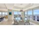 Bright dining area with water views and comfortable seating at 35 Watergate Dr # 1101, Sarasota, FL 34236