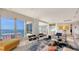 Bright living room with water views, modern furnishings and stylish decor at 35 Watergate Dr # 1101, Sarasota, FL 34236