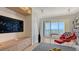 Modern living room with ocean views, contemporary decor, and a sliding glass door to the balcony at 35 Watergate Dr # 1101, Sarasota, FL 34236