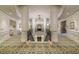 Opulent lobby showcases decorative columns, chandelier, carpet and balcony overlook at 35 Watergate Dr # 1101, Sarasota, FL 34236