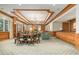 Inviting lounge area features a cozy seating arrangement and elegant chandelier, perfect for relaxing and socializing at 35 Watergate Dr # 1101, Sarasota, FL 34236