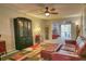 Bright living room featuring comfortable seating and access to a private balcony at 3658 Lake Bayshore Dr # 320, Bradenton, FL 34205