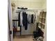 Walk-in closet with ample shelving and rod space for organized storage solutions at 3780 82Nd Avenue E Cir # 101, Sarasota, FL 34243