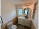 Stylish half-bathroom with stone accents, a vessel sink, and modern fixtures at 4218 S Lockwood Ridge Rd, Sarasota, FL 34231