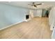 Bright living room features hardwood floors, a decorative fireplace, and ample natural light at 4218 S Lockwood Ridge Rd, Sarasota, FL 34231