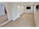 Spacious living room features a decorative brick fireplace and modern shutters at 4218 S Lockwood Ridge Rd, Sarasota, FL 34231