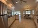 Charming kitchen and dining area with natural light and a view of the outdoor pool creating a welcoming space at 4224 Hall St, Port Charlotte, FL 33948
