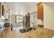 View of the kitchen featuring stainless appliances, and granite countertops at 4530 Pinebrook W Cir # 309, Bradenton, FL 34209