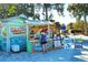 Charming beach drink stand with a colorful mural and signage, offering refreshments and beach rentals at 462 Island Cir, Sarasota, FL 34242