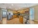 Well-equipped kitchen with stainless steel appliances and wooden cabinets at 462 Island Cir, Sarasota, FL 34242