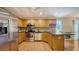 Spacious kitchen featuring stainless steel appliances and stylish breakfast bar at 462 Island Cir, Sarasota, FL 34242