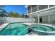 Inviting backyard pool and spa area, perfect for relaxation and entertaining at 462 Island Cir, Sarasota, FL 34242