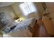 Cozy bedroom featuring wood floors, soft natural lighting, and a comfortable-looking bed at 4655 46Th Street W Ct # 201, Bradenton, FL 34210