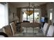 This living space has dining room and patio access with tiled floors, nice lighting, and a view at 4655 46Th Street W Ct # 201, Bradenton, FL 34210