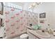 Bathroom featuring flamingo-themed shower curtain at 5003 88Th E St, Bradenton, FL 34211