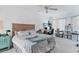 Bright bedroom with carpet, fan, and large window with blinds at 5003 88Th E St, Bradenton, FL 34211