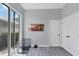 Bright room featuring a sliding glass door, closet space, and an art display at 5003 88Th E St, Bradenton, FL 34211