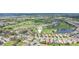 Aerial view of community and golf course with home location marker at 5105 Pine Shadow Ln, North Port, FL 34287