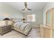 Bedroom with neutral palette, ceiling fan and lots of natural light at 5591 Cannes Cir # 403, Sarasota, FL 34231