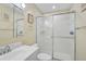 Bathroom featuring a modern vanity, toilet, mirrored cabinet, and glass-enclosed walk-in shower at 5665 Midnight Pass Rd # 410, Sarasota, FL 34242