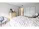 Bedroom with full bed, dresser, and ample closet space at 5904 Palm Ln # C23, Bradenton, FL 34207