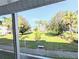 Scenic view of the community grounds with lush greenery and manicured landscaping at 5904 Palm Ln # C23, Bradenton, FL 34207