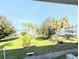 Beautiful courtyard view featuring mature trees and lush landscaping at 5904 Palm Ln # C23, Bradenton, FL 34207