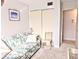 Comfortable living room space including a plush sofa and a closet for storage at 5904 Palm Ln # C23, Bradenton, FL 34207