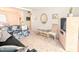 Comfortable living room with plush neutral carpeting, seating, and a stylish chair at 5904 Palm Ln # C23, Bradenton, FL 34207