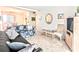 Comfortable living room with plush carpeting, inviting seating and a stylish chair at 5904 Palm Ln # C23, Bradenton, FL 34207