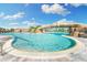 Beautiful community pool with rock waterfall and easy access stair entry at 5925 Cessna Run, Bradenton, FL 34211