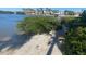 Enjoy the nearby beach with views of the water and neighboring houses at 6157 Midnight Pass Rd # E42, Sarasota, FL 34242