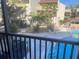 View of the community pool from the screened-in lanai at 6157 Midnight Pass Rd # E42, Sarasota, FL 34242