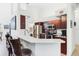 Kitchen featuring white countertops, stainless steel appliances, and an eat-in breakfast bar at 6211 90Th Avenue E Cir, Parrish, FL 34219
