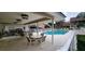 Relaxing outdoor seating area by the community pool at 6834 Fairview Ter # 6834, Bradenton, FL 34203