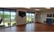 Spacious community room with large windows offering picturesque pond views at 6834 Fairview Ter # 6834, Bradenton, FL 34203