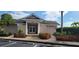 Exterior of clubhouse building with tidy landscaping and convenient parking at 6834 Fairview Ter # 6834, Bradenton, FL 34203