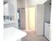 A bright laundry area with access to a laundry machine, offering added convenience for homeowners at 6834 Fairview Ter # 6834, Bradenton, FL 34203