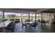 The outdoor seating has a covered patio with scenic views of the surrounding area at 6834 Fairview Ter # 6834, Bradenton, FL 34203