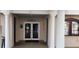 Entrance to the pro shop, showcasing a clean and professional appearance with clear signage and welcoming columns at 6834 Fairview Ter # 6834, Bradenton, FL 34203
