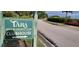 Tara Golf & Country Club sign with arrow directing to the Clubhouse at 6834 Fairview Ter # 6834, Bradenton, FL 34203