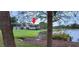 Water view featuring a pond and golf course in a serene community at 6834 Fairview Ter # 6834, Bradenton, FL 34203