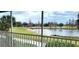 Scenic view of the community pond and golf course from the screened-in lanai at 6834 Fairview Ter # 6834, Bradenton, FL 34203