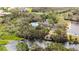 Aerial view of the community pool and pond at 6955 Stetson Street Cir, Sarasota, FL 34243