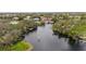 Scenic view of the lake with docks and kayaks at 6955 Stetson Street Cir, Sarasota, FL 34243