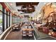 Open and airy restaurant features window views, unique light fixtures, and wood accents at 7210 Desert Ridge Gln, Lakewood Ranch, FL 34202