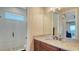 Bright bathroom featuring granite counters, glass shower and modern fixtures at 7706 Desoto Memorial Hwy, Bradenton, FL 34209