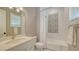 Charming bathroom with white subway tile, patterned accent tile and bright natural light at 7706 Desoto Memorial Hwy, Bradenton, FL 34209
