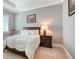 Cozy bedroom features neutral decor and comfortable furnishings at 7706 Desoto Memorial Hwy, Bradenton, FL 34209