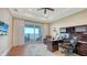 Bright home office with tray ceilings, water views, and hardwood floors at 7706 Desoto Memorial Hwy, Bradenton, FL 34209